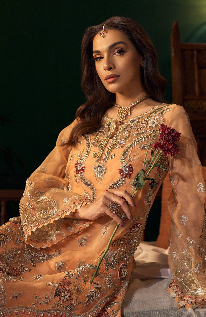 Morganite peach chiffon dress styled with pearl earrings and nude heels, perfect for a summer wedding or party fabiha fatima